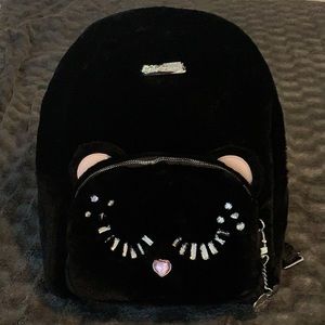 Betsey Johnson ladies bejeweled fur back pack.